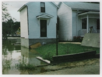 This is a view of the two buildings side by side before addition of the adjoining hallway and porch